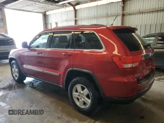 2011 Jeep Grand Cherokee Laredo with VIN 1J4RR4GG3BC669561, listed as a Copart auction lot 63627395 with 99,211 mi miles and Salvage title. Bid and sale history available at DreamBid. Image 2.
