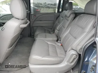 2008 Honda Odyssey EX-L z VIN 5FNRL38738B037025, wystawiony jako Copart lot #53354455 z przebiegiem 161 291 mil mil oraz Szkoda całkowita • Salvage title. Historia ofert i sprzedaży dostępna na DreamBid. Obrazek 11.