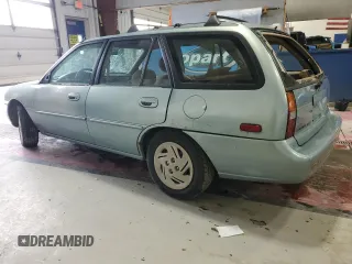 1997 Ford Escort LX with VIN 3FALP15P9VR107467, listed as a Copart auction lot 76061074 with 69,873 mi miles and Clean Title. Bid and sale history available at carsss.com. Image 2.