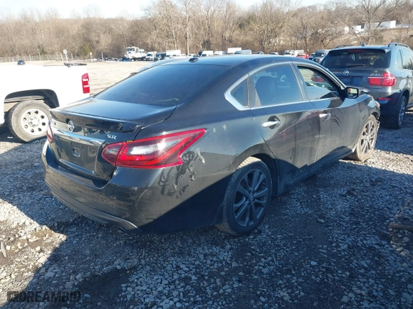 2018 Nissan Altima 2.5 SL with VIN 1N4AL3AP2JC249527, listed as a IAAI auction lot 41315829 with 62,931 mi miles. Bid and sale history available at carsss.com. Image 4.