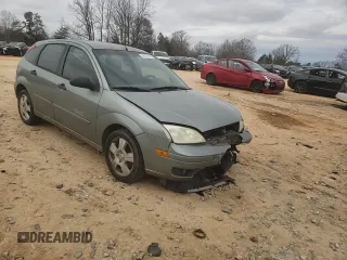 2006 Ford Focus S with VIN 1FAHP37N76W180039, listed as a Copart auction lot 58328565 with 220,696 mi miles and Salvage title. Bid and sale history available at DreamBid. Image 10.