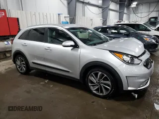 2017 Kia Niro Touring with VIN KNDCE3LC3H5094332, listed as a Copart auction lot 47012995 with 115,257 mi miles and Salvage Title. Bid and sale history available at carsss.com. Image 4.