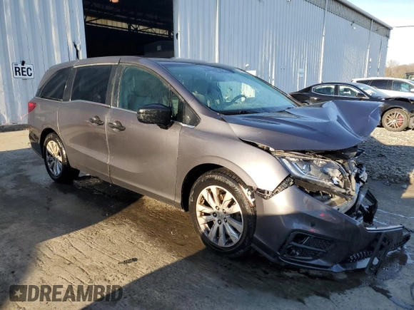 2019 Honda Odyssey LX with VIN 5FNRL6H24KB023597, listed as a Copart auction lot 81958364 with 135,347 mi miles and Salvage Title. Bid and sale history available at DreamBid. Image 4.