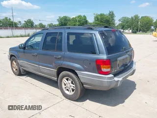 2002 Jeep Grand Cherokee Laredo with VIN 1J4GW48SX2C206755, listed as a IAAI auction lot 42631502 with 155,752 mi miles and . Bid and sale history available at DreamBid. Image 3.