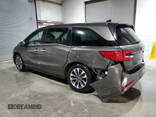 2022 Honda Odyssey EX-L z VIN 5FNRL6H71NB008541, wystawiony jako Copart lot #56850895 z przebiegiem 32 466 mil mil oraz Szkody całkowita. Historia ofert i sprzedaży dostępna na DreamBid. Obrazek 2.