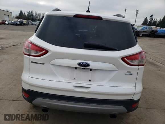 2014 Ford Escape SE with VIN 1FMCU9GX2EUB46825, listed as a Copart auction lot 44631105 with 133,827 mi miles and Salvage Title. Bid and sale history available at carsss.com. Image 6.