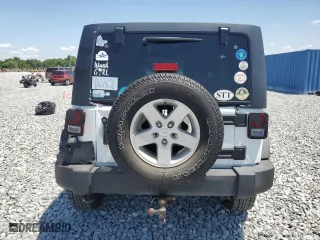 2015 Jeep Wrangler Unlimited Sport with VIN 1C4BJWDG8FL644580, listed as a Copart auction lot 52952365 with 127,439 mi miles and Salvage Title. Bid and sale history available at carsss.com. Image 6.
