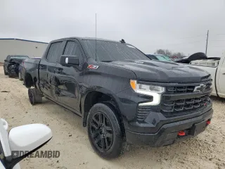 2022 Chevrolet Silverado 1500 LT Trail Boss with VIN 3GCUDFET5NG654765, listed as a Copart auction lot 82947694 with 77,747 mi miles and Salvage Title. Bid and sale history available at DreamBid. Image 4.