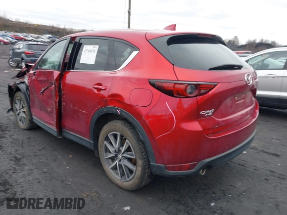 2018 Mazda CX-5 Grand Touring with VIN JM3KFBDM0J0427753, listed as a IAAI auction lot 41740838 with 69,683 mi miles and . Bid and sale history available at DreamBid. Image 3.