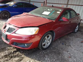 2009 Pontiac G6 1SB with VIN 1G2ZJ57KX94259078, listed as a IAAI auction lot 41223904 with 129,681 mi miles and . Bid and sale history available at DreamBid. Image 18.
