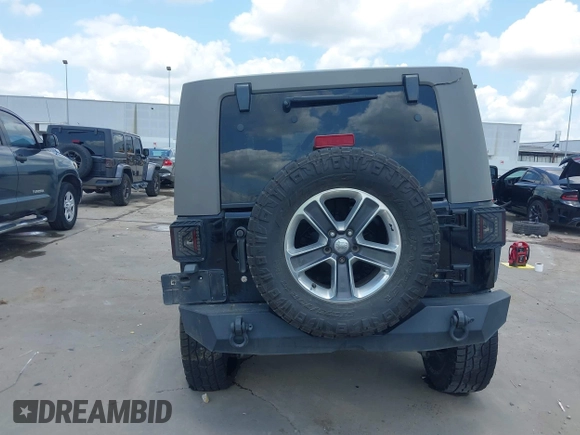 2008 Jeep Wrangler Unlimited Sahara with VIN 1J4GB59198L619802, listed as a IAAI auction lot 42361793 with 272,295 mi miles and . Bid and sale history available at DreamBid. Image 17.