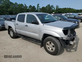 2009 Toyota Tacoma PreRunner with VIN 3TMJU62NX9M082642, listed as a Copart auction lot 57395705 with 160,365 mi miles and Salvage title. Bid and sale history available at DreamBid. Image 4.