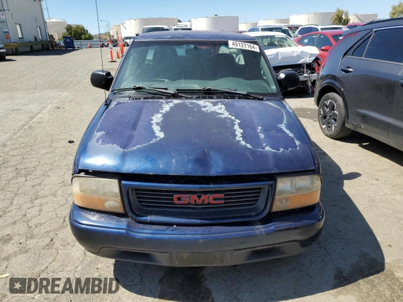 2000 GMC Sonoma SLS z VIN 1GTCS19W0Y8206050, wystawiony jako Copart lot #49122164 z przebiegiem 264 070 mil mil oraz Szkody całkowita. Historia ofert i sprzedaży dostępna na DreamBid. Obrazek 5.