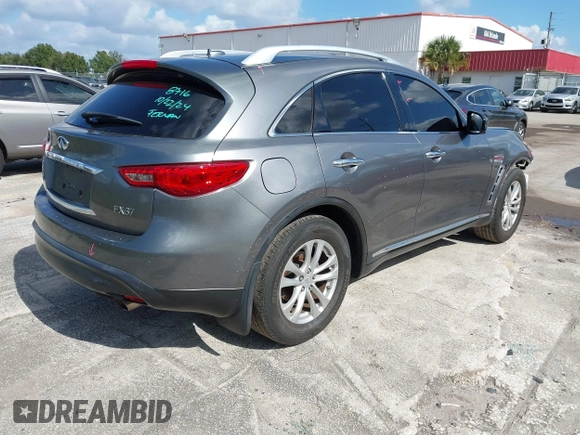 2013 Infiniti FX with VIN JN8CS1MU0DM140711, listed as a IAAI auction lot 40796518 with 179,386 mi miles and . Bid and sale history available at DreamBid. Image 4.