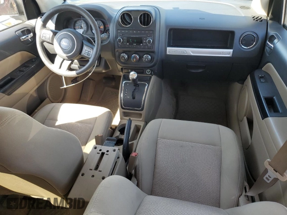 2016 Jeep Compass Sport with VIN 1C4NJDBB4GD511836, listed as a Copart auction lot 49989595 with 106,850 mi miles and Salvage Title. Bid and sale history available at carsss.com. Image 8.