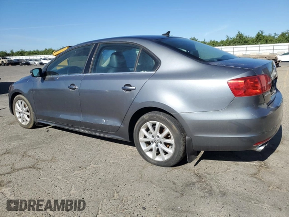 2014 Volkswagen Jetta SE with VIN 3VWD07AJXEM315231, listed as a Copart auction lot 58258075 with 99,860 mi miles and Salvage title. Bid and sale history available at DreamBid. Image 2.