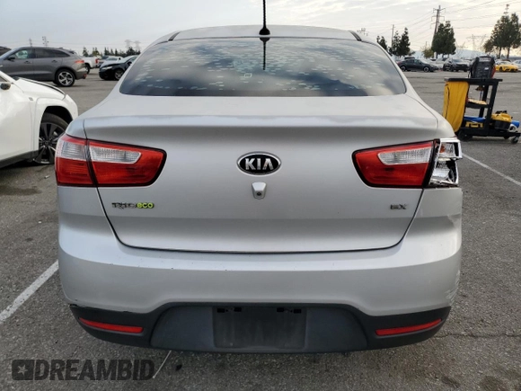 2014 Kia Rio EX z VIN KNADN4A30E6353469, wystawiony jako Copart lot #43788955 z przebiegiem 156 096 mil mil oraz Szkoda całkowita • Salvage title. Historia ofert i sprzedaży dostępna na DreamBid. Obrazek 6.