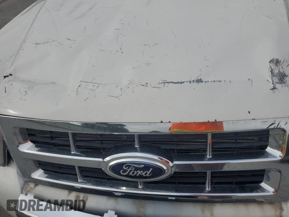 2012 Ford Escape Limited с VIN 1FMCU9EG1CKC48497, выставлен на аукционе Copart как лот 64093065 с пробегом 189 856 миль миль и Списание • Salvage title. История ставок и продаж доступна на DreamBid. Изображение 12.