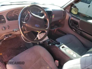 2003 Ford Ranger XL Fleet with VIN 1FTZR45E73PB25100, listed as a Copart auction lot 50071555 with 230,001 mi miles and Salvage Title. Bid and sale history available at carsss.com. Image 8.
