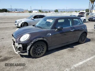 2014 MINI Hardtop with VIN WMWXM5C57ET934120, listed as a Copart auction lot 58594845 with 115,248 mi miles and Salvage title. Bid and sale history available at DreamBid. Image 1.