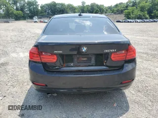 2014 BMW 3 Series 328i xDrive с VIN WBA3B5C50EF599611, выставлен на аукционе Copart как лот 61939875 с пробегом Не указан миль и Списание • Salvage title. История ставок и продаж доступна на DreamBid. Изображение 6.