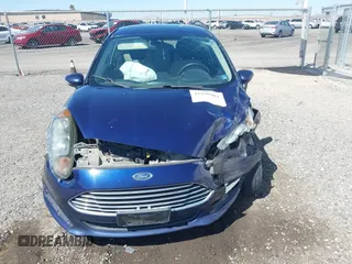 2016 Ford Fiesta SE z VIN 3FADP4EJ8GM150098, wystawiony jako IAAI lot #41890402 z przebiegiem 126 492 mil mil oraz . Historia ofert i sprzedaży dostępna na DreamBid. Obrazek 12.