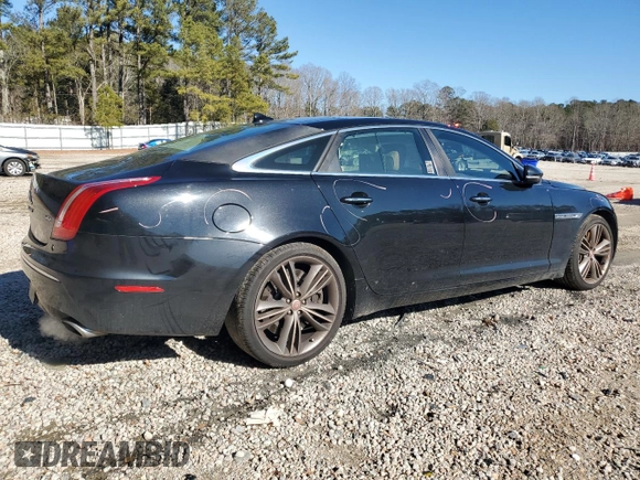 2015 Jaguar XJ with VIN SAJWA2GT8FMV83276, listed as a Copart auction lot 86521754 with 105,010 mi miles and Salvage Title. Bid and sale history available at DreamBid. Image 3.