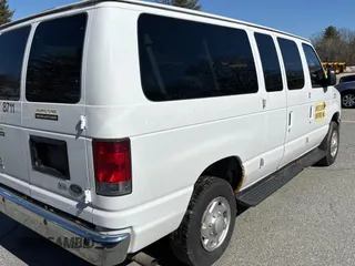 2014 Ford Econoline Passenger XL with VIN 1FBNE3BL1EDA64827, listed as a Copart auction lot 48927855 with 102,965 mi miles and Clean title. Bid and sale history available at DreamBid. Image 4.