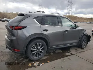2017 Mazda CX-5 Grand Touring with VIN JM3KFBDL4H0163339, listed as a Copart auction lot 50566495 with 83,453 mi miles and Salvage Title. Bid and sale history available at carsss.com. Image 3.