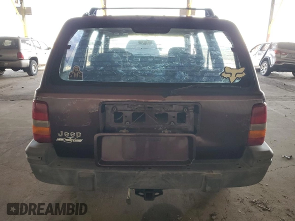 1995 Jeep Grand Cherokee Laredo with VIN 1J4GZ58S1SC704775, listed as a Copart auction lot 87556535 with 266,365 mi miles and Salvage title. Bid and sale history available at DreamBid. Image 6.