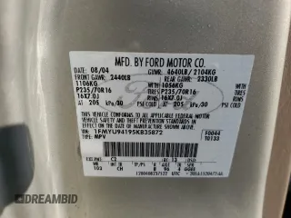 2005 Ford Escape Limited with VIN 1FMYU94195KB35872, listed as a Copart auction lot 63285755 with 145,638 mi miles and Salvage title. Bid and sale history available at DreamBid. Image 13.