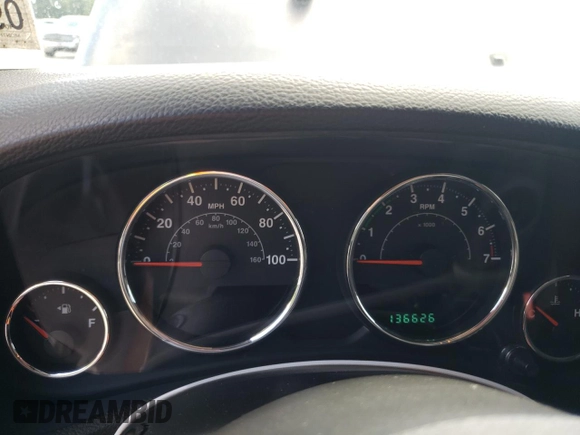 2012 Jeep Wrangler Sport z VIN 1C4AJWAG2CL245174, wystawiony jako Copart lot #63161425 z przebiegiem 136 626 mil mil oraz Czysty tytuł • Clean title. Historia ofert i sprzedaży dostępna na DreamBid. Obrazek 9.