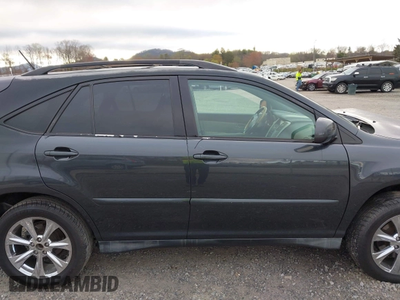 2005 Lexus RX with VIN 2T2GA31U65C040798, listed as a IAAI auction lot 41906233 with 211,026 mi miles. Bid and sale history available at carsss.com. Image 14.