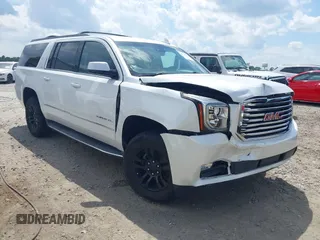 2017 GMC Yukon XL SLT z VIN 1GKS2GKC5HR160468, wystawiony jako IAAI lot #42166908 z przebiegiem 131 469 mil mil oraz . Historia ofert i sprzedaży dostępna na DreamBid. Obrazek 1.