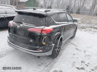 2017 Toyota RAV4 SE with VIN 2T3JFREV5HW591932, listed as a IAAI auction lot 41628183 with 142,599 mi miles. Bid and sale history available at carsss.com. Image 4.