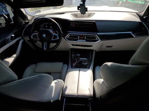 2021 BMW X5 M with VIN 5YMJU0C01M9F10602, listed as a Copart auction lot 65668883 with 23,214 mi miles. Bid and sale history available at carsss.com. Image 8.