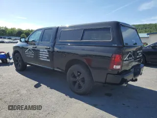 2014 Ram 1500 Express with VIN 1C6RR7FTXES388025, listed as a Copart auction lot 57968005 with 125,232 mi miles and Salvage title. Bid and sale history available at DreamBid. Image 2.