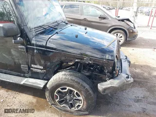 2013 Jeep Wrangler Unlimited Freedom Edition with VIN 1C4BJWDG8DL648870, listed as a IAAI auction lot 41909372 with 184,203 mi miles. Bid and sale history available at carsss.com. Image 6.