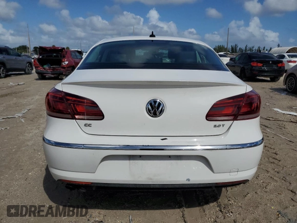 2013 Volkswagen CC Sport with VIN WVWBN7AN7DE522906, listed as a Copart auction lot 76385704 with 101,063 mi miles and Salvage Title. Bid and sale history available at DreamBid. Image 6.
