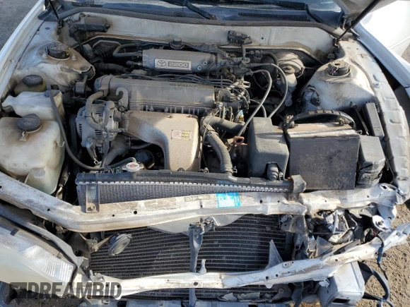 1992 Toyota Camry LE with VIN 4T1SK12E0NU064956, listed as a Copart auction lot 50665925 with 228,909 mi miles and Salvage Title. Bid and sale history available at carsss.com. Image 13.