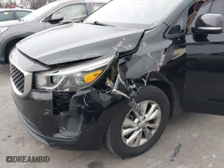 2016 Kia Sedona L with VIN KNDMA5C15G6168708, listed as a IAAI auction lot 41695088 with 105,364 mi miles. Bid and sale history available at carsss.com. Image 12.