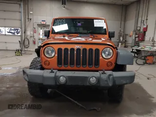 2011 Jeep Wrangler Rubicon with VIN 1J4BA6D15BL624268, listed as a IAAI auction lot 41430121 with 142,433 mi miles and . Bid and sale history available at carsss.com. Image 13.