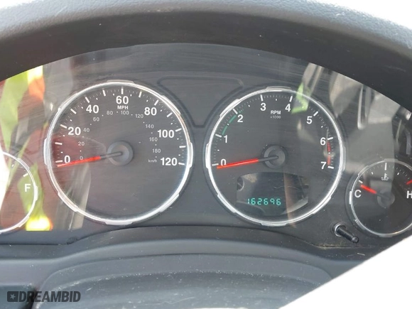 2012 Jeep Liberty Sport with VIN 1C4PJLAK9CW120779, listed as a IAAI auction lot 41901708 with 162,696 mi miles. Bid and sale history available at carsss.com. Image 7.