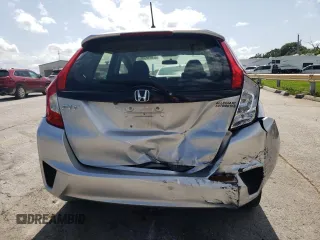 2016 Honda Fit LX z VIN JHMGK5H57GX020610, wystawiony jako Copart lot #61012305 z przebiegiem 99 001 mil mil oraz Szkoda całkowita • Salvage title. Historia ofert i sprzedaży dostępna na DreamBid. Obrazek 6.