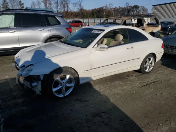 2005 Mercedes-Benz CLK-Class 3.2L with VIN WDBTJ65J15F144304, listed as a Copart auction lot 85023534 with 129,465 mi miles and Salvage Title. Bid and sale history available at carsss.com. Image 1.