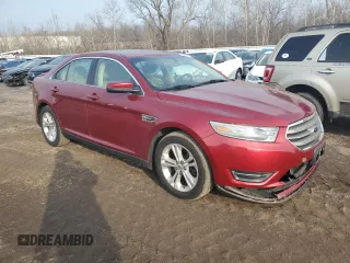 2014 Ford Taurus SEL with VIN 1FAHP2E8XEG123009, listed as a Copart auction lot 42724724 with 117,639 mi miles and Salvage Title. Bid and sale history available at DreamBid. Image 4.