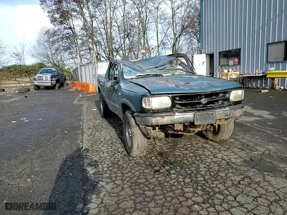1994 Mazda B-Series 4WD Truck LE with VIN 4F4DR17X5RTN10704, listed as a Copart auction lot 87230804 with 227,476 mi miles and Salvage Title. Bid and sale history available at carsss.com. Image 11.