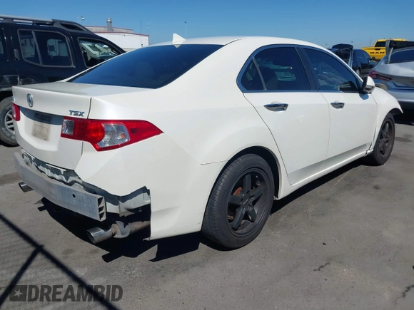 2009 Acura TSX with VIN JH4CU266X9C025233, listed as a IAAI auction lot 41871889 with 198,408 mi miles. Bid and sale history available at carsss.com. Image 4.