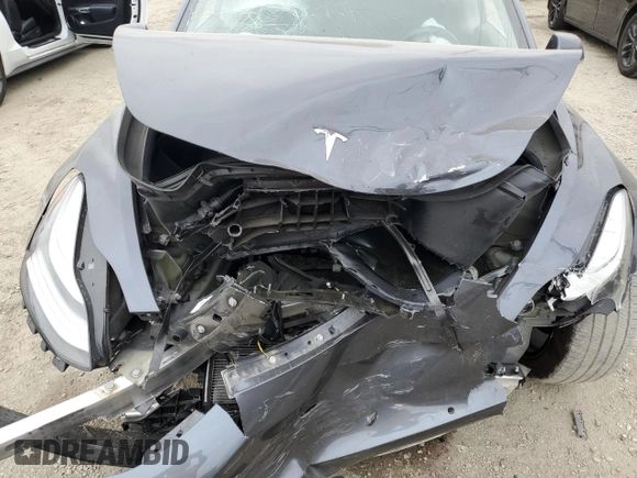 2018 Tesla Model 3 Long Range Battery z VIN 5YJ3E1EA7JF123805, wystawiony jako Copart lot #56034325 z przebiegiem 90 249 mil mil oraz Szkoda całkowita • Salvage title. Historia ofert i sprzedaży dostępna na DreamBid. Obrazek 11.