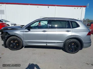 2023 Volkswagen Tiguan SE R-Line Black with VIN 3VVCB7AX7PM137019, listed as a IAAI auction lot 40731252 with 20,098 mi miles. Bid and sale history available at carsss.com. Image 14.